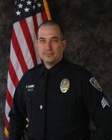Official photo of Captain Keith Welch in formal uniform.